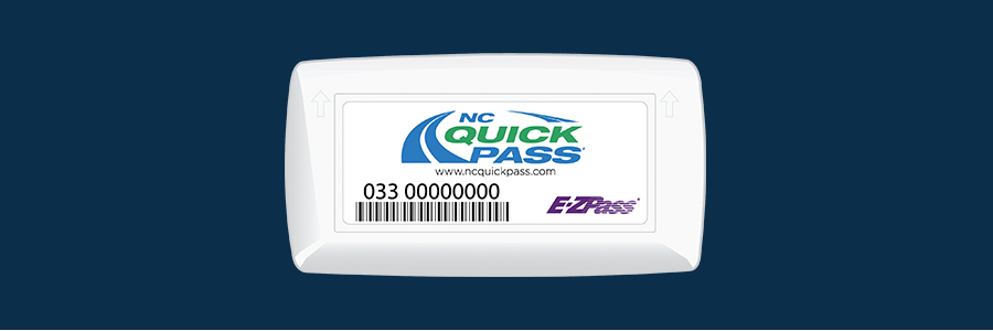 NC Quick Pass transponder on dark blue background