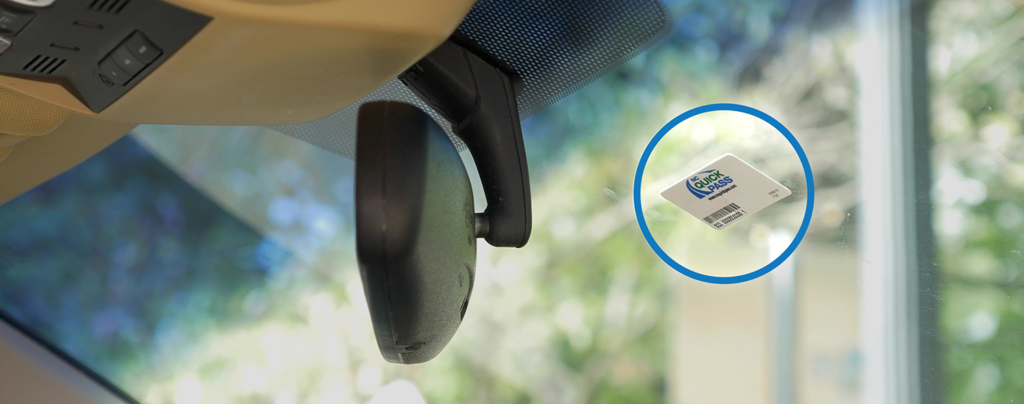 Close up of NC Quick Pass transponder on windshield